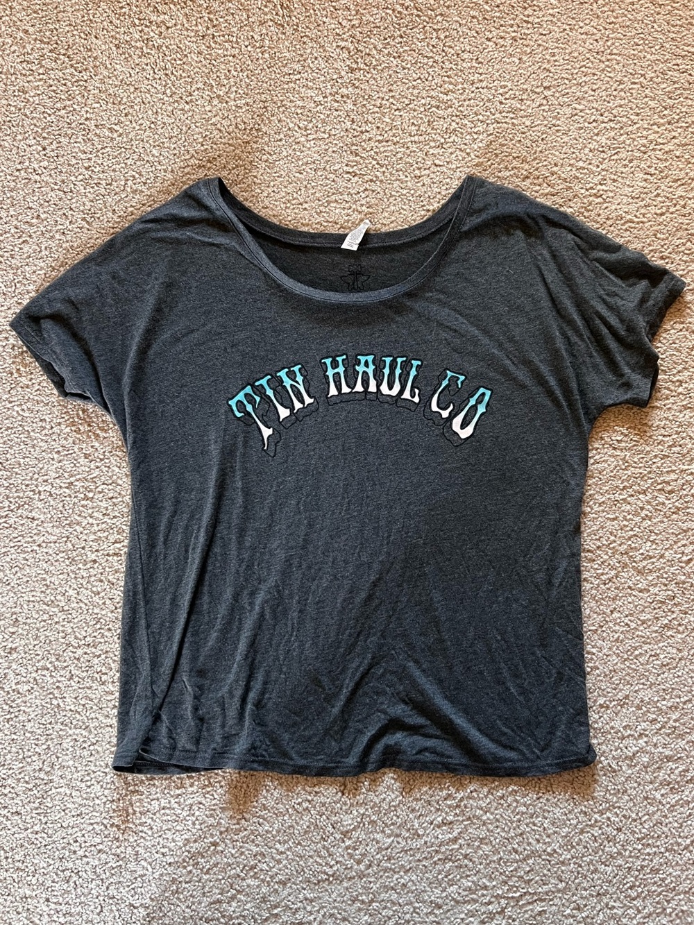 Tin Haul Black Short Sleeve Tee with Teal White Logo